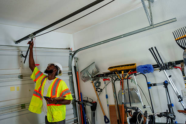 Professional Garage Door Panel Replacement technician working in Yell County County, AR